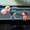 Nova decoração do carro clipe de saída de ar bonito dos desenhos animados casais figura de ação balão ornamento interior do automóvel acessórios do painel