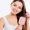 Escovas de cabelo oco para fora escova de cabelo dentes largos almofada de ar pente pente de massagem para couro cabeludo feminino escova de cabelo salão de beleza DIY ferramenta de cabeleireiro x0804