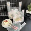 Wrap prezent 50pcs jedzenie plastikowa torba mody Piotowa torba kamizelka pizza burger zewnętrzna torba do pakowania supermarket