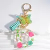 Fashion Letters A to Z Dry Flower Keychain Butterfly Tassel Pendant Keyring for Women Car Key Holder Handbag Accessories Gift