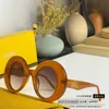 2024 New High Quality luxury designer New Luo Yijia sunglasses round frame mesh red INS the same style personalized and fashionable Sunglasses LW40089