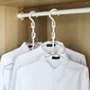 Kleiderbügel Platzsparender Kleiderbügel 4 Schichten Kunststoff Home Living Rack Multifunktions-Rutschfester Aufbewahrungsschrank