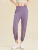 Женские леггинсы модные карманы свободные брюки для йоги высокая талия собрала ноги с твердым цветом.