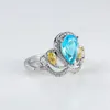 Anneaux de mariage de luxe femme poire coupe lac bleu pierre couronne pour femmes couleur argent jaune Zircon bandes bijoux de fiançailles de mariée