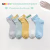 OC TL2001 # Chaussettes pour enfants personnalisées Mouvement des étudiants Jardin d'enfants Paradis des enfants Chaussettes en coton en gros avec identification du motif