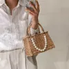 Bolsos de noche de paja y bolsos de mano de verano de ratán hecho a mano para mujer RibbonsSummer Beach Basket Bag Pearl Beads Travel 230804