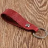 Keychains vintage handgjorda läder kohud rep nyckelring metall snidad mönster nyckel täcker bilring gåva