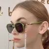 2024 Nouveau nouveau concepteur de luxe de haute qualité Le nouveau rouge en ligne de Xiangjia avec la même personnalité japonaise et INS Pearl Chain pour les lunettes de soleil polyvalentes pour femmes CH5988S