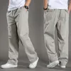 Pantaloni da uomo Pantaloni da uomo a gamba dritta in vita tinta unita con elastico in vita Pantaloni da uomo casual sottili resistenti all'usura in cotone