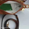 Borsa Alta qualità 2024 Liquidazione Gnocco all'ingrosso Portafoglio con tracolla all'ingrosso Nylon Manico corto Mano a contrasto Cosmetico Cognac Colore Mano Mini borsa