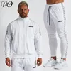 Męskie dresy męskie drotnie bawełniane haftowany patchwork sportowy luz obfite kurtka mody Twopece Set Gym Running Training Suit 230804