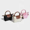 Bag High 2024 quality Clearance Dumpling Wholesale Wholesale Shoulder strap wallet Nylon Short Handle Hand Contrast Cosmetic Cognac Color Hand Mini handbag