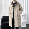 Мужские траншевые пальто мужчины дизайнерские карманы сплошной цветовой молнии модного отдыха подростки длинные створки стильные изумки Hombre корейский стиль H29 230804