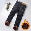 Jeans masculino térmico inverno neve quente de pelúcia esticado homem grosso de lã jeans calças compridas pai casual soltas