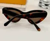 Occhiali da sole Cat Eye bianchi grigi Occhiali da sole estivi da donna gafas de sol Sonnenbrille UV400 Eye Wear con scatola