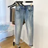 Heren dunne designer jeans effen kleur slim fit motorfiets fietsers denim voor heren mode mans zwart wit blauw hiphop broek