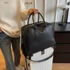 Duffel Bags 2023 Kurzstrecken-Damen-Reisetasche, lässig, groß, für Frauen, große Sportreisen, solides Board-Leder