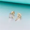 Fábrica Precio más bajo Mujeres Estilo elegante 10 karat oro blanco redondo moissanite pendientes de tachuelas precio