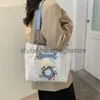 Shoulder Canvas feminina grande capacidade 2023 versão coreana novo círculo de lazer versátil bolsas de nicho de um ombro bolsas elegantes