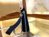 Designer luxury pochette voyage chain woven shoulder bag Briefcase knitting printed letter beige bicolor men's and women's messenger bag handbag