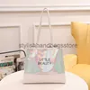 Borse a tracolla Borsa da donna 2023 Nuova lettera stampata Bright Face Handheld Shopping Bag Borse casual