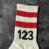 22SS مخططة Red Sport Socks Rrr123 Socks Men Women Cotton Rrr123 Socks High Street Fours Seasons Tiny Spark T230806