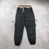 Pantaloni da uomo 2023 Primavera Autunno Tuta Macchina per il tempo libero Funzione Tasca a vento Cintura con coulisse Giunzione allentata