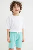 Jessie prende a calci le maglie di moda MMY # JLA32 Abbigliamento per bambini in cotone atletico Ourtdoor Sport Customs