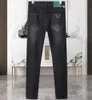 Designer Uomo Jeans Elasticità Jean Hombre Pantaloni Uomo e donna Marchio di moda Pantaloni di lusso Pantaloni denim Tendenza Moto Bottoni skinny Buono {category}