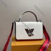 Designer axelväska kvinna handväska mode twist väskor enkelt läder lyx varumärke crossbody handväska plånbok populär metallkedja messenger väska