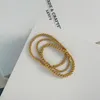 Strand rostfritt stål pärlstav armband 14k guldpläterade runda pärlor stretchbara elastiska för kvinnor handgjorda smycken gåva