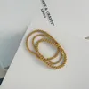 Bracciale con perline in acciaio inossidabile con perline in oro 14k perline rotonde elastiche elastiche per regalo di gioielli fatti a mano da donna