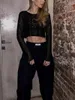 Kvinnors T -skjortor Kvinnor S Shimmering Sequin Empelled Crop Top med långa ärmar - Glamorös metallblus för kvällsfester som klubbar