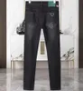designerskie dżinsy elastyczność Jean hombre spodnie Mężczyźni i kobiety moda marka luksusowe spodnie dżinsowe sproszone marka marki motocyklowe spodnie męskie przyciski logo 46 46