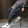 Jeans da uomo Pantaloni da uomo Streetwear Harem Baggy Elastico in vita Gamba larga nera Vestibilità ampia Hip Hop Pantaloni da uomo alla moda per ragazzi