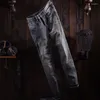 Jeans da uomo Stilista Uomo Alta qualità Retro Grigio Blu Elastico Slim Fit Ricami strappati Pantaloni denim vintage Hombre