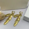 Tasarımcı Kadınlar İçin Altın Küpeler Sterlling Aşk Küpel Küpe Kadın Tüy Charm Stud Dangle Moda Burch Hoops Küpe