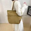 Totes 2023 Nuevo bolso de ocio Tendencia de mujer Bolso de clase de estudiante universitario Bolso de hombro coreano de gran capacidad Bolsos de mano elegantes