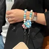 Ciondoli per cinturini per cellulari Nuovo cordino per cellulare Bracciale con fiore di girasole Anti-perso Cinturino da polso Portachiavi Custodia per auricolare Borsa per carte Accessorio carino