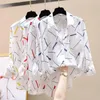 Kvinnors blusar 2023 kläder våren koreanska lösa randiga skjortor kvinnliga långärmade tunna damknappar avslappnade R115