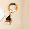 Porte-clés à la mode coloré gland bois Bracelet perles Silicone porte-clés téléphone portable voiture sac à dos pendentif pour femmes hommes bijoux cadeaux
