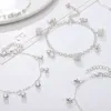 Cavigliere alla moda in argento con campana scava fuori la catena del piede con ciondolo a forma di stella per gli accessori per gioielli con bracciale da spiaggia estiva da donna