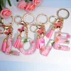 Pink Dry Flower 26 Initial A To Z Resin Keychain With Butterfly Tassel Pendant Shiny Keyring for Women Girl Handbag Accessories