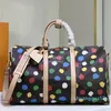 Saco Duffle de viagem Bolsas de bagagem Bolsas de mão Dot Bolsa Mochila Feminina Tote colorido Bolsas masculinas Bolsas masculinas de couro genuíno Clutch Wallet