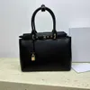 top kwaliteit lederen triomfboog dames designer tas met zwarte luxe handtassen grote capaciteit aktetas draagbare grote tas 230815