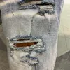 Męskie dżinsy Drobne łatki to modne spodnie marki damskie luźne spodnie 1Z2X12107