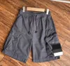 Mens Shorts Stones Island Tasarımcılar Kargo Pantolon Rozet Yamaları Yaz Sweatports Sports Pantolon 2023SS Büyük Cep Tabancalar Pantolonlar Zippper 965ss