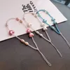 Cellband charms mobil lanyard kort lanyard handled band handbärande kreativ keramisk kärlek hänge kvinnors anti-förlorade slingrem