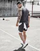 Short Homme Grande Taille 2 en 1 Running Gris Noir Loisirs Séchage Rapide Sport Poches Fermeture Éclair