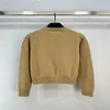 2023 FW Kvinntröjor Knits Designer Tops med brev broderad banan Brand Designer Crop Top Cashmere Shirt High End Elasticity Pullover Outwear Knitwear